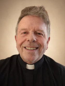 ./Fr_Tim_Head_shot_1792609953810
